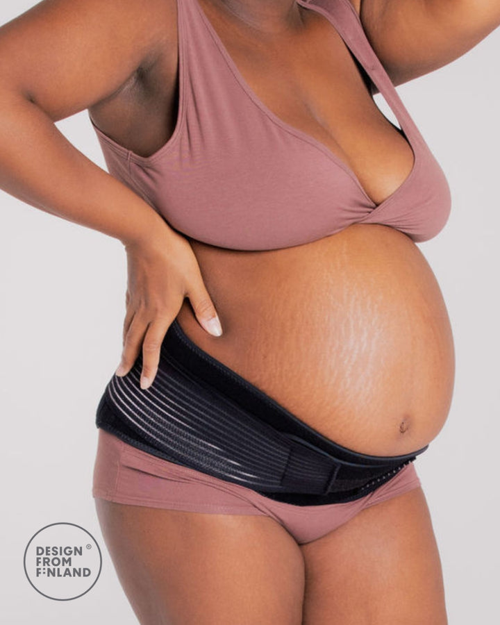 pregnant mum wearing support belt