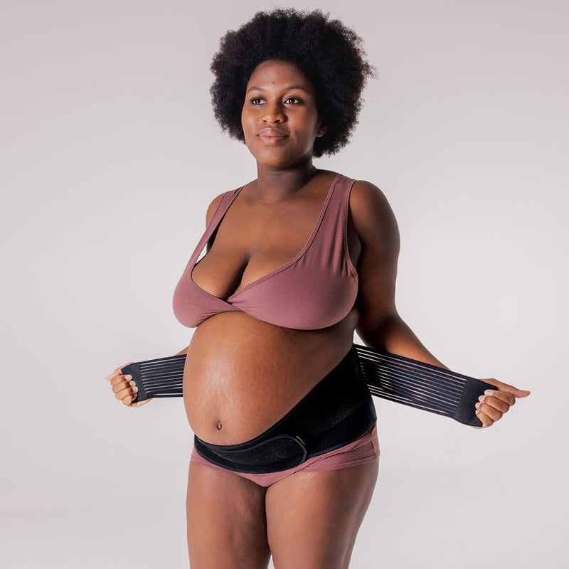 mum  wearing pregnancy support belt