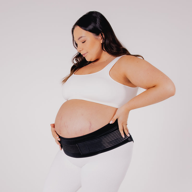 pregnant mum wearing support belt