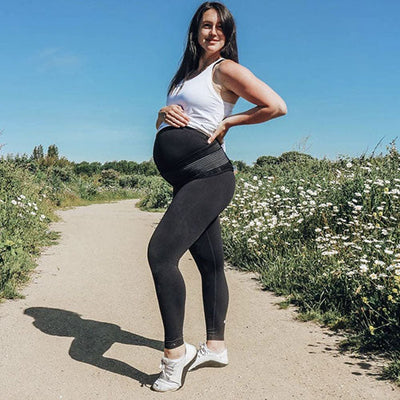 outdoor mum wearing pregnancy support belt