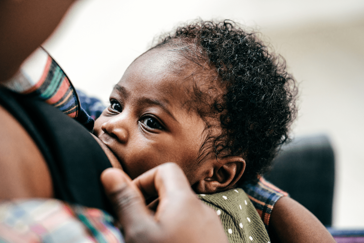 Mother nurturing her baby through breastfeeding