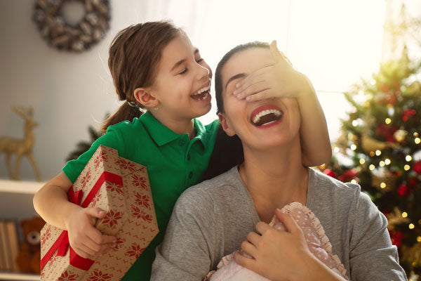 A daughter surprising her mother on Christmas Day