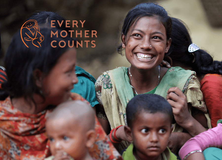 Indian women with their children with “Every mother counts” logo