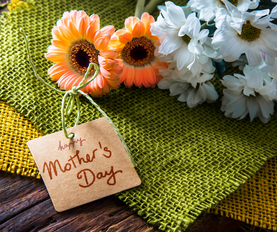 flowers accompanied by a heartfelt Mother's Day card