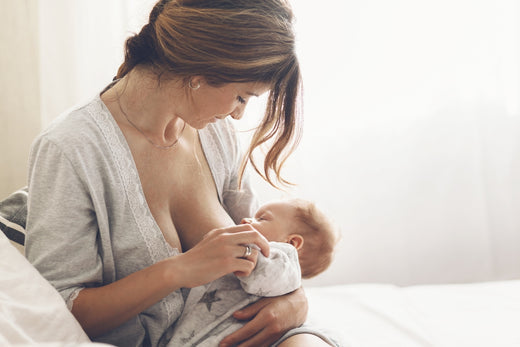 A woman breastfeeding her child 