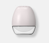 Bloome wearable breast pump with a white body and transparent bottom container.