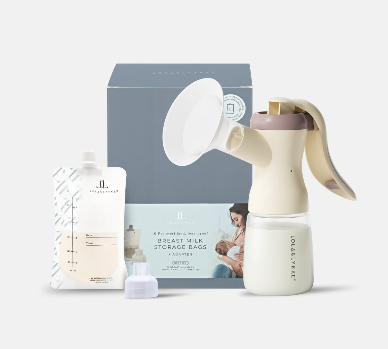 Breast pump, storage bags, and packaging on a light gray background